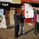 Kenyans stand in the streets in the western part of Nairobi, as preliminary results trickle in for Monday's general election.